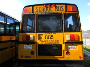 lot 885 image: 2009 THOMAS 31 PASSENGER SCHOOL BUS WITH WHEEL CHAIR LIFT
