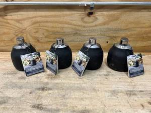 lot 29 image: BETTER HOMES AND GARDENS Lot of 4- Tabletop Torches