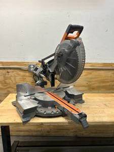 lot 4 image: RIDGID 15 Amp Corded 12 in. Dual Bevel Sliding Miter Saw with 70 Deg. Miter Capacity and LED Cut Line Indicator