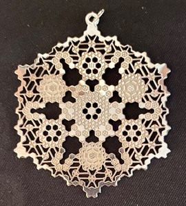 lot 143 image: Three Metropolitan Museum of Arts Sterling Silver Snow Flake Ornaments