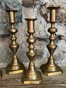 lot 33 image: Two Pairs of Vintage Brass Candle Stick Holders