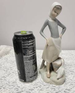 lot 40 image: Lladro Girl With Goose Chicks