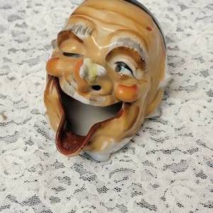 lot 98 image: Japanese Figural Smoker Figural Ash Tray