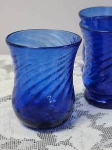 lot 50 image: Cobalt Blue Swirl Cordial Set  Decanter and Glassware