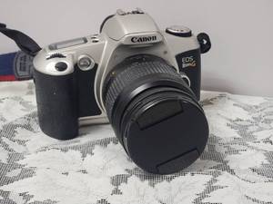 lot 140 image: Canon EOS Rebel Camera with 58MM Lens