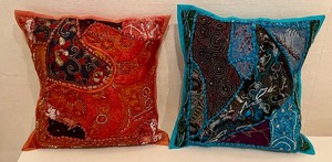 lot 52 image: Four Colorful Accent Pillows
