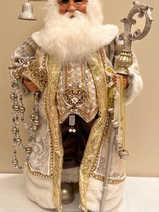 lot 175A image: Karen Didion Ivory and Golden Decorative Santa Figurine