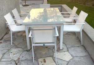 lot 128 image: Glass Top PatioTable with 6 Chairs by Home Couture