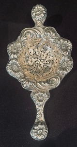 lot 167 image: Antique Sterling Silver Tea Strainer