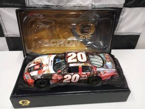 lot 43 image: Action Elite Tony Stewart #20 Milestone  2X Nascar Champion 124th Scale Die Cast Car