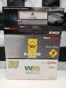lot 56 image: Team Caliber 124 Scale Die Cast Cars