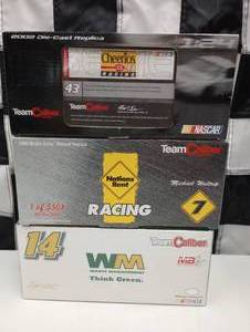 lot 57 image: Team Caliber 124 Scale Die Cast Cars