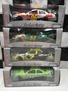 lot 61 image: Team Caliber Pit Stop 124th Scale Die Cast Cars,