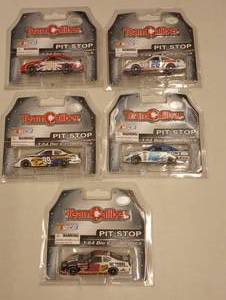 lot 62 image: Team Caliber Pit Stop 164th Scale Die Cast Cars