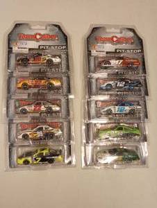 lot 63 image: Team Caliber Pit Stop 164th Scale Die Cast Cars