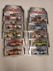 lot 68 image: Team Caliber Pit Stop 164th Scale Die Cast Cars
