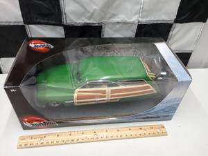 lot 76 image: Hot Wheels 1950 Merc Woodie 118th Scale Die Cast Car