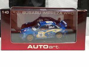 lot 175 image: Autoart Subaru Impreza WRC 143rd Scale Die Cast Car