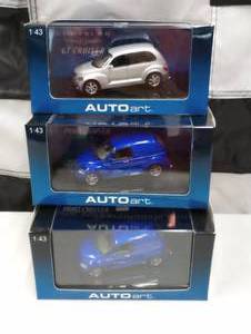 lot 165 image: Autoart Chrysler Panel Cruiser 143rd Scale Die Cast Cars