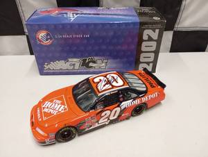 lot 211 image: Action Racing AUTOGRAPHED Tony Stewart #20 Home Depot 124th Scale Die Cast Car