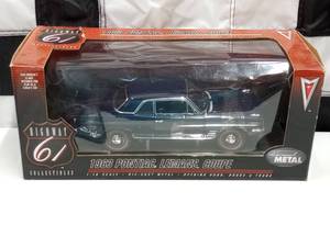 lot 221 image: Highway 61 Collectibles 1963 Pontiac Lemans Coupe 118th Scale Die Cast Car