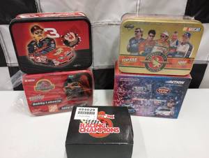 lot 229 image: Assorted Nascar Tins With 164th Scale Die Cast Cars