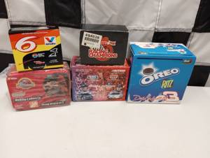 lot 230 image: Assorted Nascar Tins Boxes  With 164th Scale Die Cast Cars,