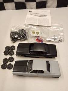 lot 260 image: AMT Jokers Goon Car Gotham City Police Car Model Kit