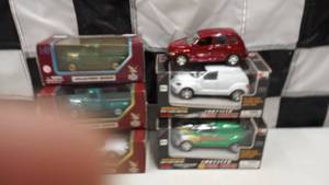 lot 304 image: Road Legends 143rd Scale Die Cast Cars