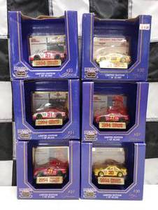 lot 309 image: Racing Champions Brickyard 400 Inaugural Race 164th Scale Die Cast Cars