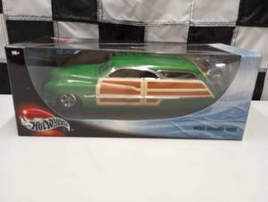 lot 335 image: Hot Wheels Merc Woodie 1950 118th Scale Die Cast Car.