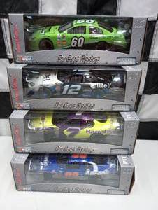 lot 337 image: Team Caliber Pit Stop 124th Scale Die Cast Cars