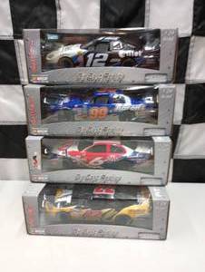 lot 338 image: Team Caliber Pit Stop 124th Scale Die Cast Cars,
