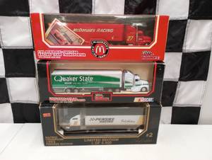 lot 483 image: Racing Champions 164th Scale Die Cast Transporters