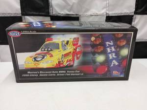 lot 525 image: Racing Champions NHRA Phil Burkart Jr. Murrays Discount Auto 124th Scale Die Cast Top Fuel Dragster