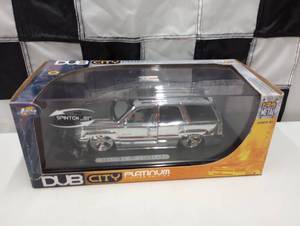 lot 540 image: Jada Toys  Dub City Platinum Cadillac Escalade 124th Scale Die Cast Car