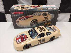 lot 592 image: Action AUTOGRAPHED Elliot Sadler M&Ms #38  124th Scale Die Cast Car