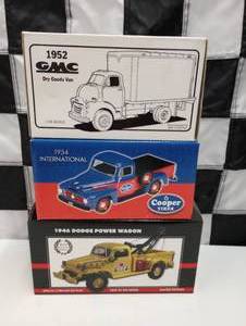 lot 657 image: Assorted Truck Die Cast Coin Banks.