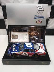lot 706 image: Owners Elite Dale Earnhardt Jr. #8 Budweiser  Stars & Stripes 124th Scale Die Cast Car