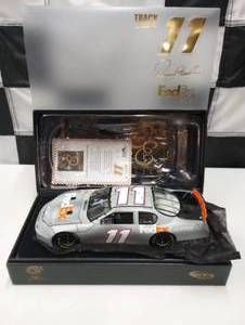 lot 707 image: Owners Elite Denny Hamlin #11 FedEx  Track Tested 124th Scale Die Cast Car