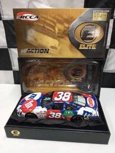 lot 719 image: Action Elite Elliot Sadler #38 M&Ms  4th July 124th Scale Die Cast Car