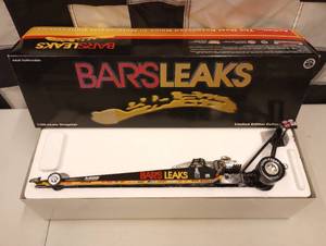 lot 772 image: Action Bars Leaks Top Fuel Dragster 124th Scale Die Cast