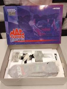 lot 798 image: Action Mac Tools John Force Castrol GTX  9X Champion 124th Scale Die Cast Funny Car
