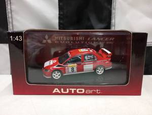 lot 814 image: Autoart Mitsubishi Lancer Evolution WRC143rd Scale Die Cast Car