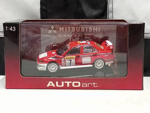 lot 815 image: Autoart Mitsubishi Lancer Evolution WRC143rd Scale Die Cast Car
