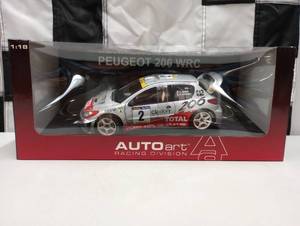 lot 827 image: Autoart Performance Peugeot 206 WRC 118th Scale Die Cast Cars
