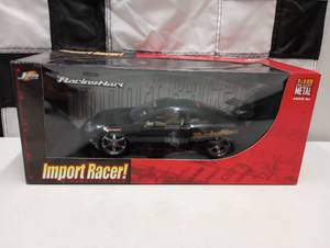 lot 840 image: Jada Toys Import Racer Toyota Celica 118th Scale Die Cast Car