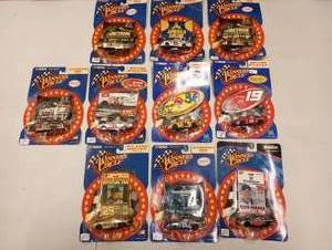lot 908 image: Winners Circle Driver Sticker & 164th Scale Die Cast Cars