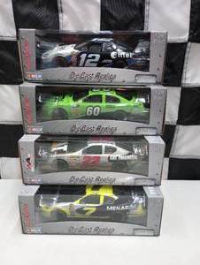 lot 976 image: Team Caliber Pit Stop 124th Scale Die Cast Cars