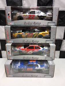 lot 979 image: Team Caliber Pit Stop 124th Scale Die Cast Cars